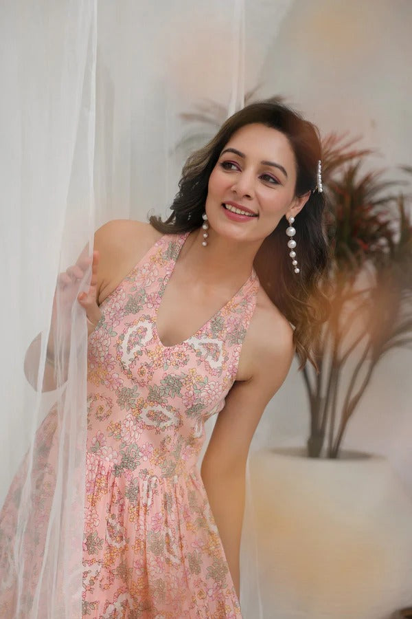 Women Peach Floral Printed Halter Neck Maxi Dress | Elegant Summer Resort Wear